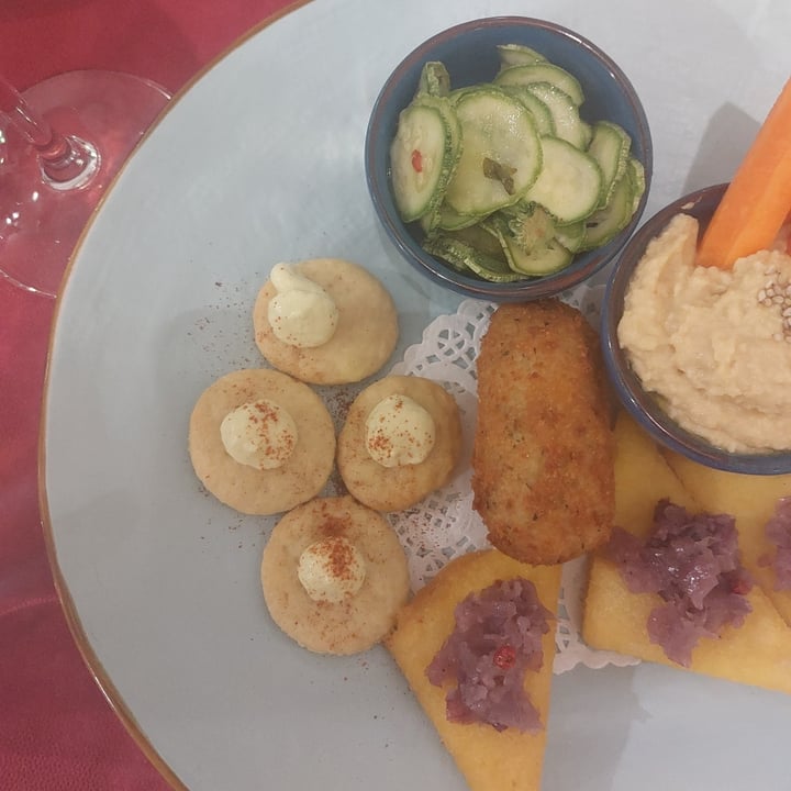 review photo of MagnEtico Bistrò Mixed appetizers with hummus, polenta fritters, zucchini salad shared by @icookvegan on 16 Sep 2022 - review