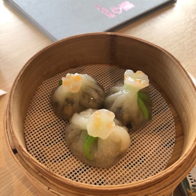 Photo of the dish “Truffle Mixed Mushroom Dumplings”