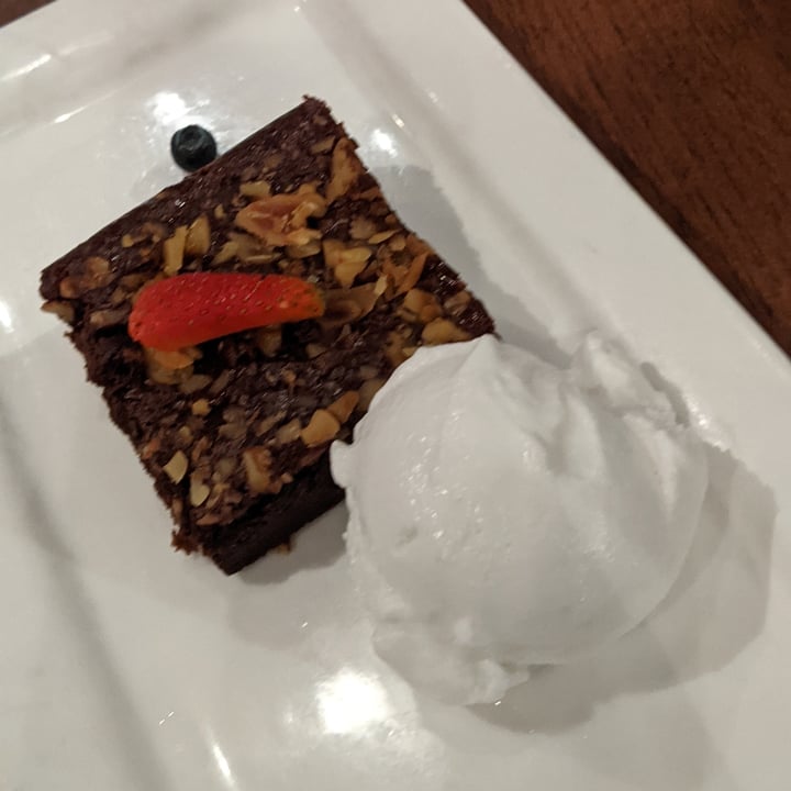 photo of Original Sin Mediterranean Restaurant Vegan Brownie with Coconut Ice Cream shared by @oblongboxes on  07 May 2021 - review