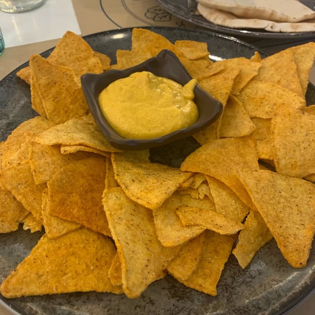 Photo of the dish “Nachos with cheddar sauce”