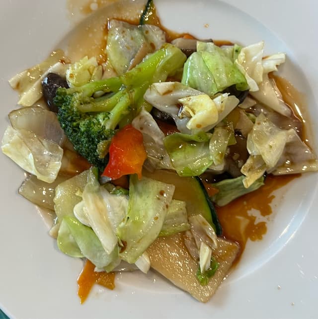 「verdure miste saltate al wok」の料理の写真