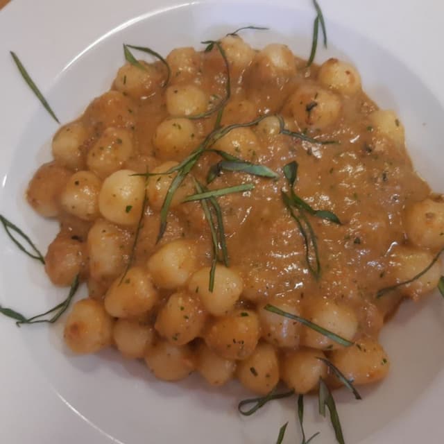 Photo of the dish “Gnocchi al pesto di pomodori secchi e mandorle”