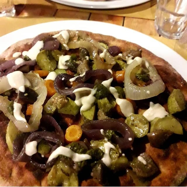 菜肴“Pizza con farine speciali”的照片