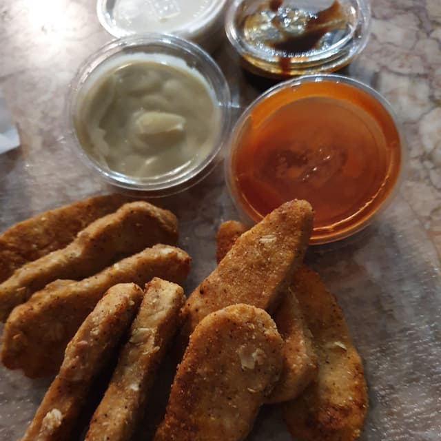 Photo of the dish “Crispy Chik'n Tenders”