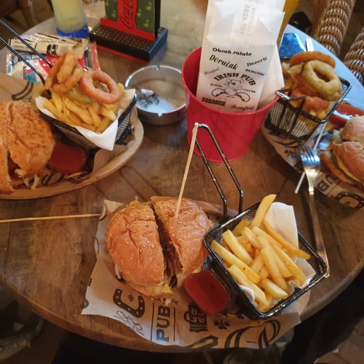 photo of Irish Pub Beyond cheeseburger with onion rings and fries shared by @vegdana on  07 May 2022 - review