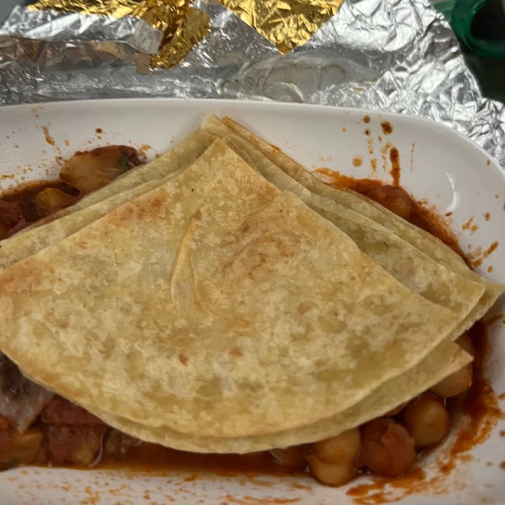 photo of eva airlines chickpea tomato base with roti shared by @cave-tranquil on  10 Oct 2022 - review