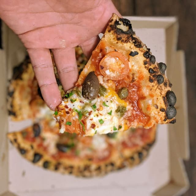 Photo of the dish “Puttanesca pizza”
