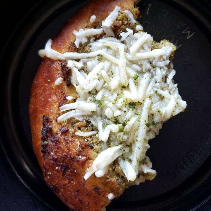photo of Coven plant based marketplace Pesto Pizza Bun shared by @whatacuriousnotion on  19 Aug 2022 - review
