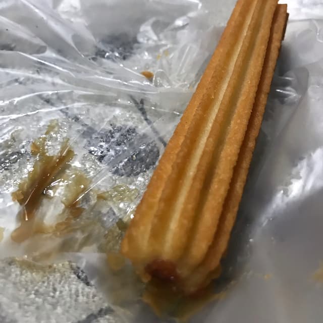 Foto do prato “Churros De Membrillo”