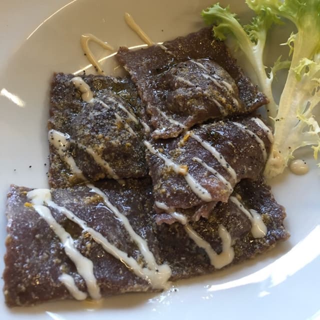 Foto del piatto “Cocoa Ravioli filled with Pumpink”