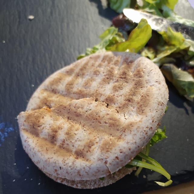 Photo of the dish “Tigelle Integrali Con Patè Di Pomodori Secchi, Scaglie Di Grana Veg E Rucola”