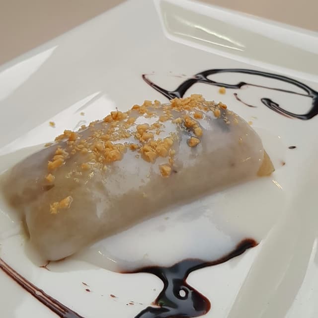 Photo du plat “Gedämpfte Banane in Klebreis”