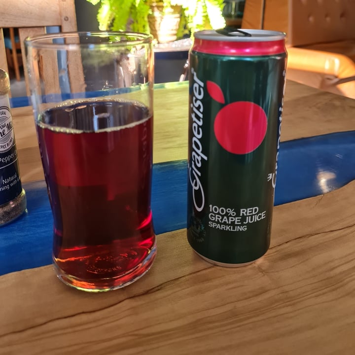 photo of Coca-Cola 100% Red Grap Juice Sparkling shared by @makeadifference on  19 Jun 2022 - review
