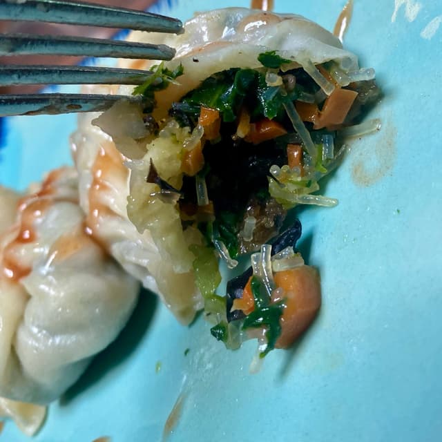 菜肴“Ravioli di verdure al vapore”的照片