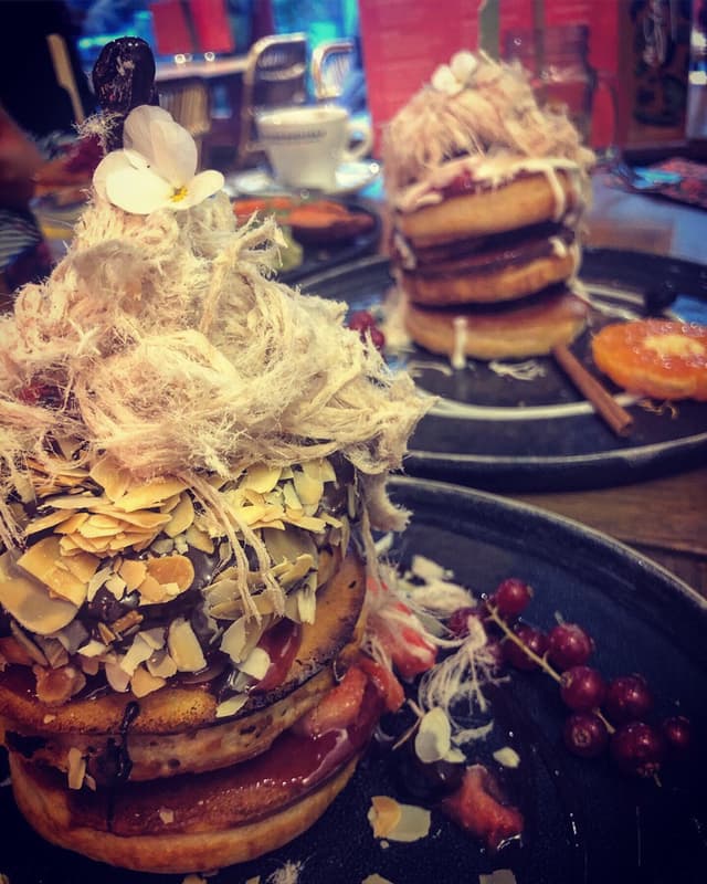 Photo of the dish “Choco Protein Stack, Vegan Burger, Beetroot Hummus Stack and Cinnamon Rollercoaster Stack”