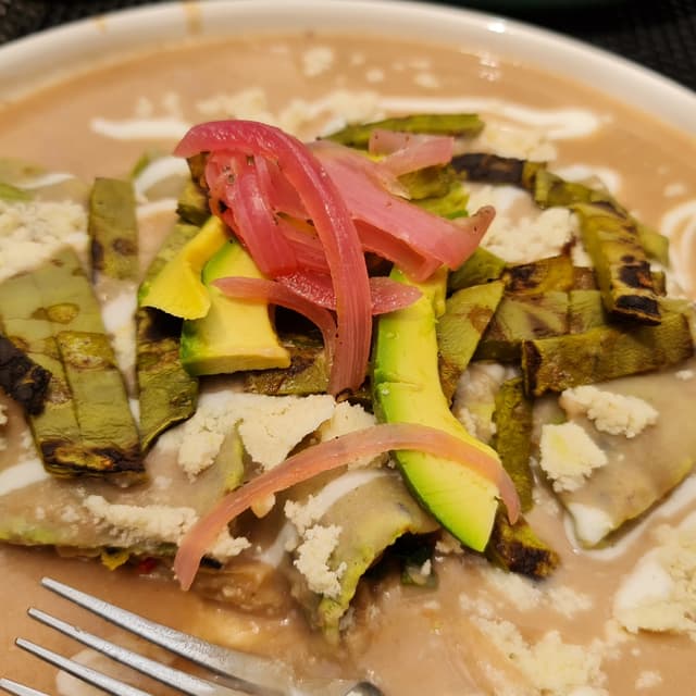 Photo of the dish “Enfrijoladas Rellenas De Espinaca Y Calabaza”