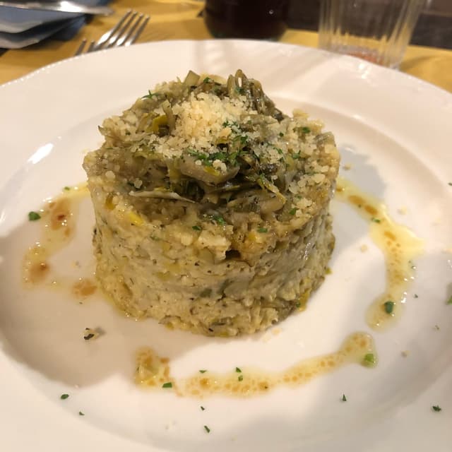 菜肴“Tortino di miglio ai carciofi”的照片
