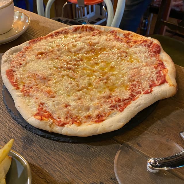 Photo of the dish “Margarita pizza”