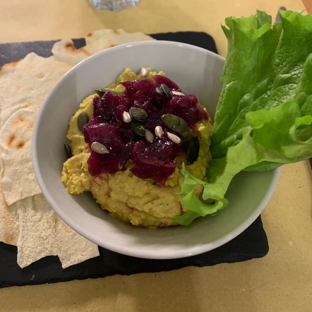 Photo of the dish “Hummus Di Ceci Con Cipolle Caramellate”