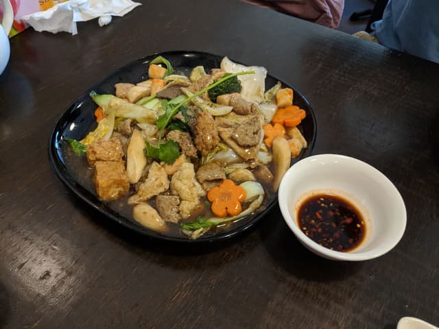 Photo of the dish “"Ap Chao" style rice noodles with gravy sauce”
