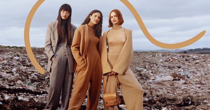 models standing around a landfill