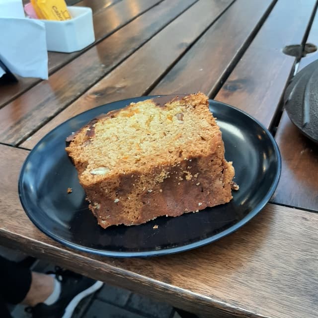 Photo of the dish “Budín de naranja y almendras con chocolate”