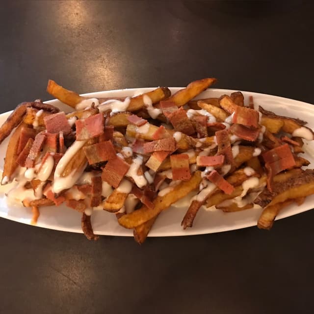 Photo of the dish “Patatas fritas con bacon”