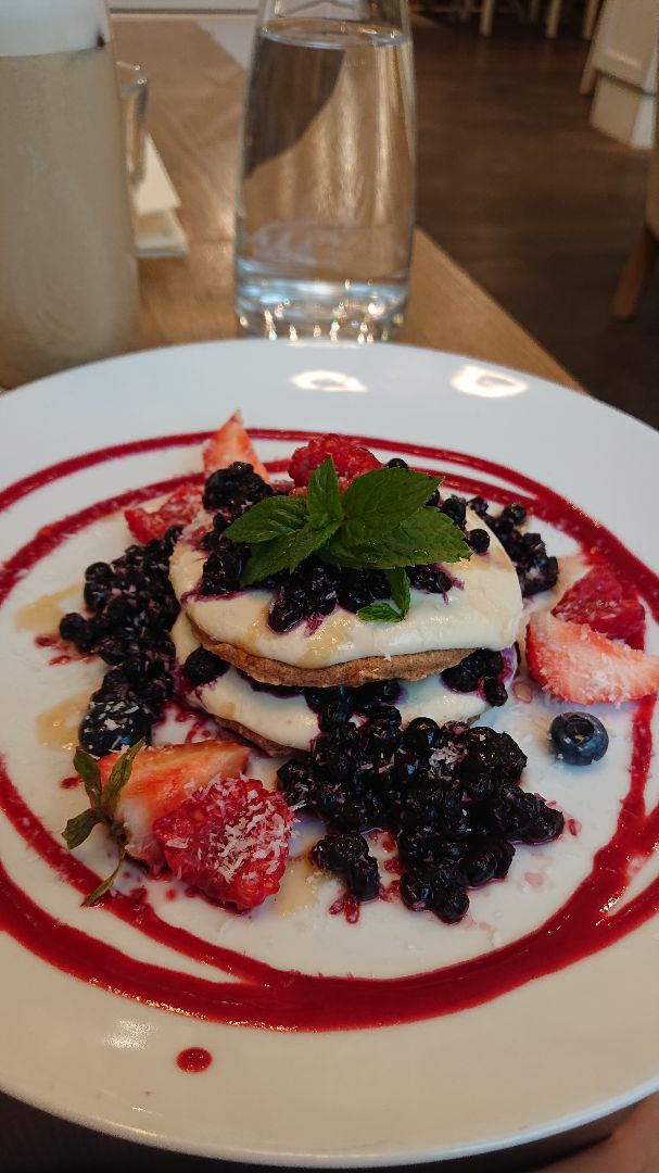 photo of MyRaw Café Pancakes with cashew cream and bluberries shared by @vreakylena on  27 Aug 2019 - review