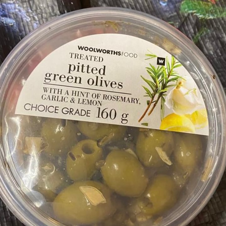 Woolworths Food Pitted Green Olives with a hint of rosemary, garlic and
