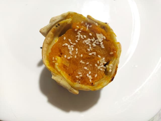 菜肴“Empanada Calabaza y Espinaca”的照片