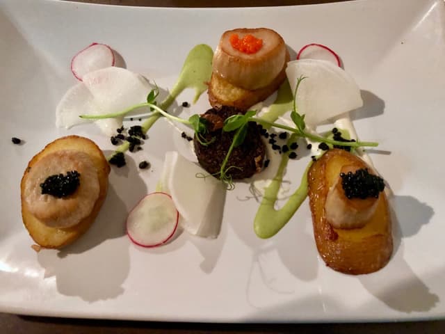 Photo of the dish “Skallops with roasted potatoes, Soya Schnitzels and Chocolate and avocado mousse”
