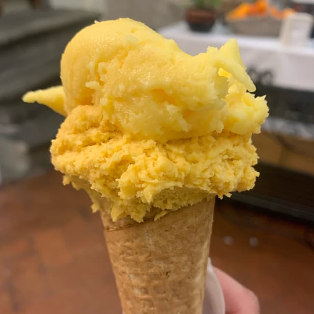 Photo of the dish “Gelato crema dell’orto e mandrino e arancia”