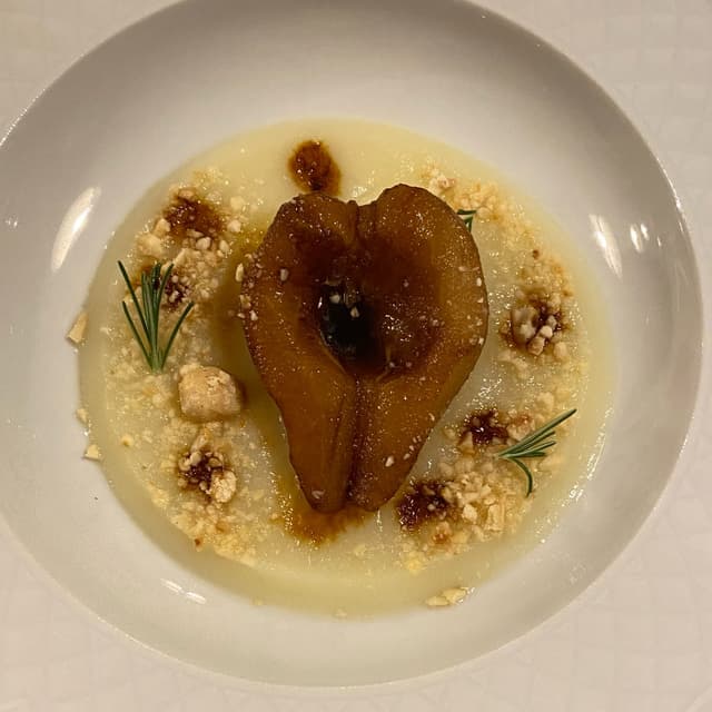 Photo of the dish “vellutata di sedano rapa con pera caramellata, nocciole e rosmarino”