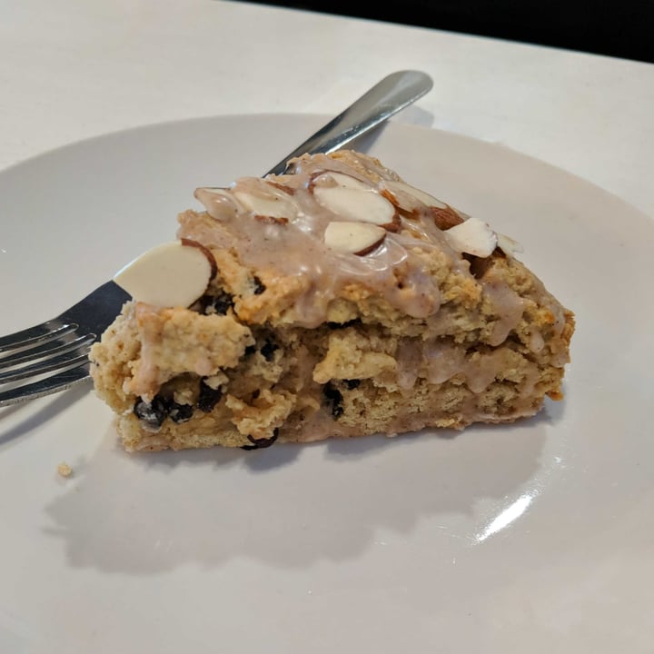 photo of Therapy Ice Cream and Coffee Bar Currant scone with almond slices and a cinnamon glaze (vegan) shared by @fuzzydestroyer on  09 Mar 2022 - review