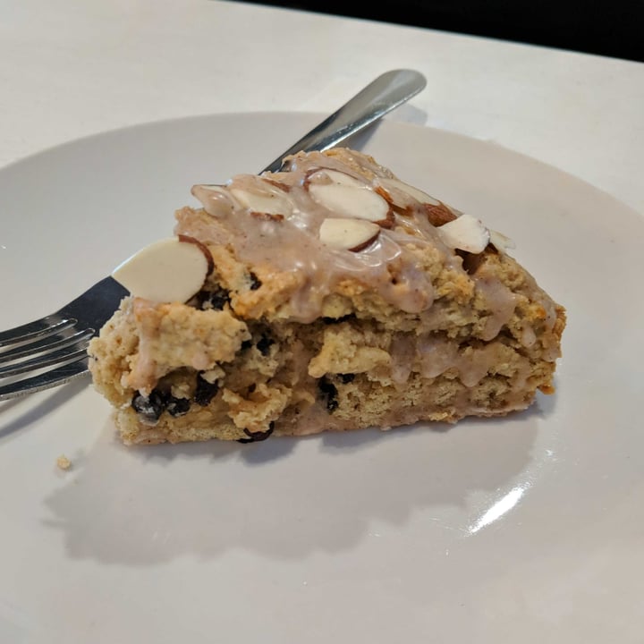 review photo of Therapy Ice Cream and Coffee Bar Currant scone with almond slices and a cinnamon glaze (vegan) shared by @fuzzydestroyer on 09 Mar 2022 - review