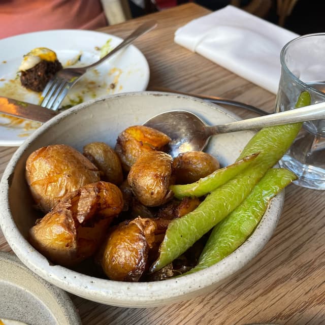 Foto del plato “Smashed Batata Harra”