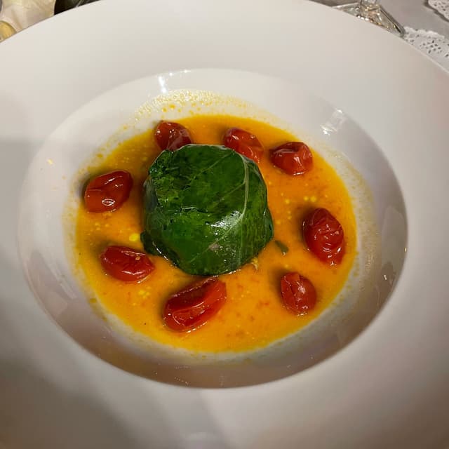 Photo of the dish “Involtino Di Bietola, Patate Cuore Rosso ‘ Perle Della Tuscia’ , Guazzetto Di Pomodoro ‘all’acqua di mare’”