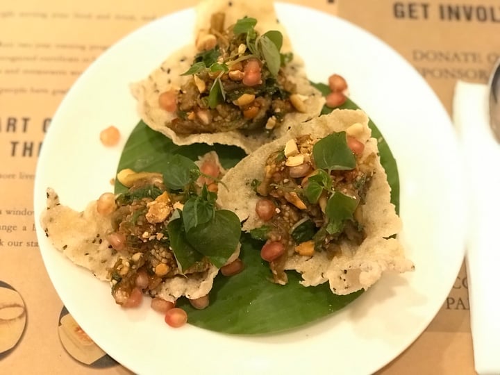 review photo of KOTO Saigon - a Training Restaurant Smoked eggplant salad, pomegranate with sesame rice crackers shared by @msbonnieyu on 20 Dec 2017 - review