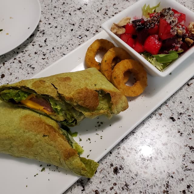 菜肴“Avocado & Omnipork Luncheon Burrito, served with Beetroot Salad & Deep Fried Konjac”的照片