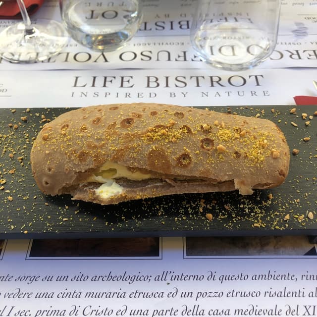 Photo of the dish “Involtino Di Farina Di Castagne Con Salsa Di Melanzane”