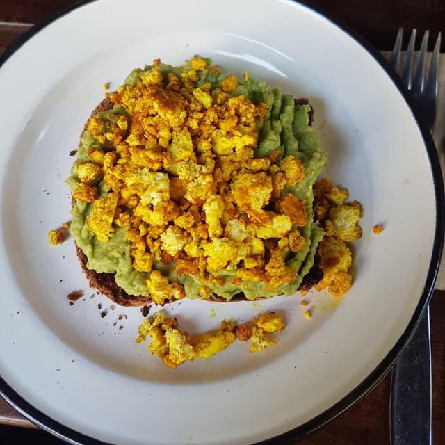Photo of the dish “Tofu Scramble con Palta en tostada de semillas”