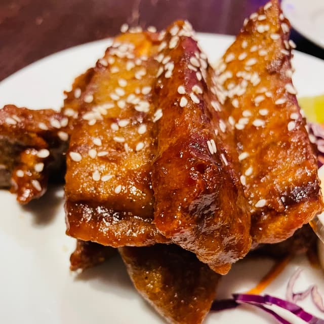 Photo of the dish “THAI CHILI WINGS”