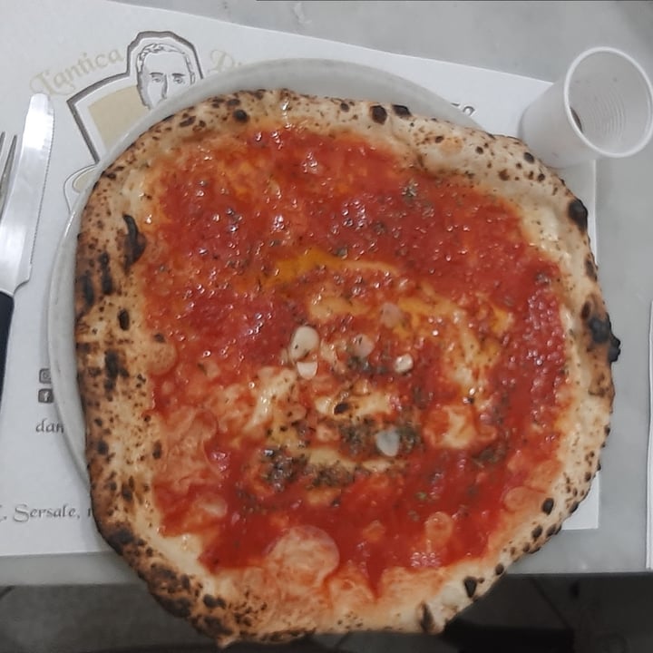 photo of L' Antica Pizzeria Da Michele Pizza Marinara shared by @fegmtt on  02 Jul 2022 - review