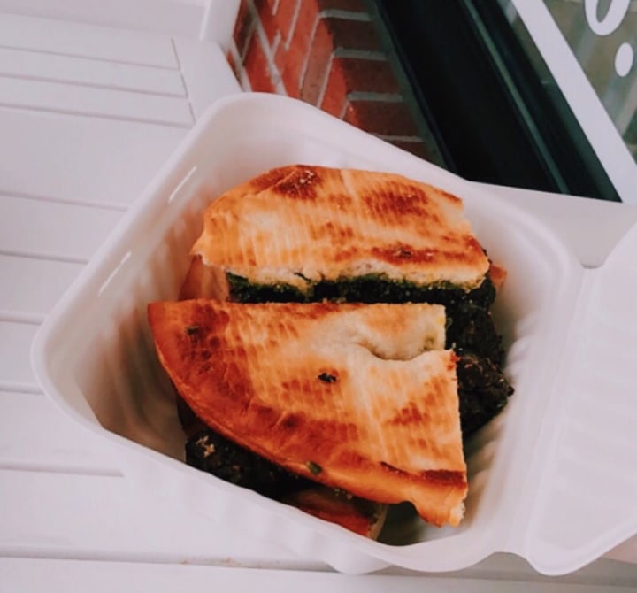 review photo of Three Girls Vegan Creamery Italian sausage on pesto fried dough shared by @liseoks on 01 Apr 2020 - review