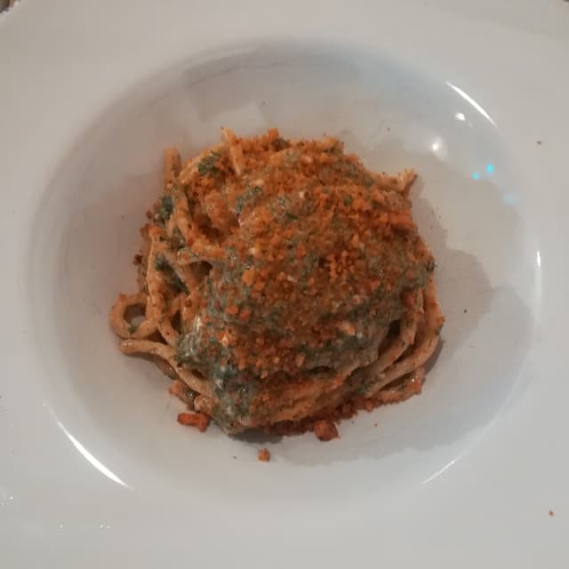 Photo of the dish “Pici con farina di grano verna allo zafferano con pesto di finocchietto e briciole di pane al pomodoro”