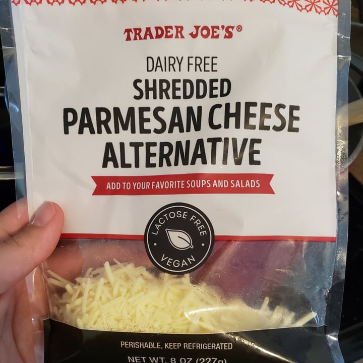 review photo of Trader Joe's Dairy-free shredded parmesan cheese alternative shared by @lexiegoats on 14 May 2022 - review