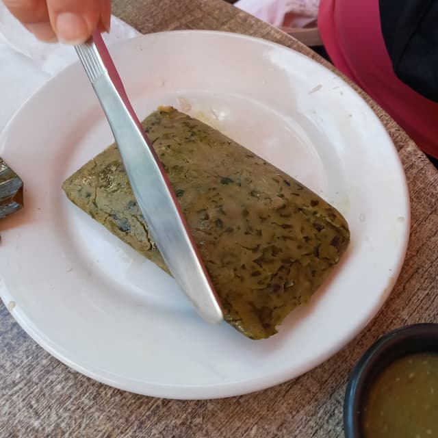 「Tamal Vegetariano De Espinacas」の料理の写真