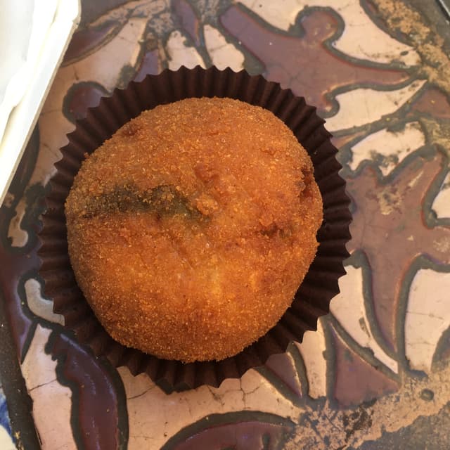 Foto del plato “Arancina al forno con ragù di verdure”