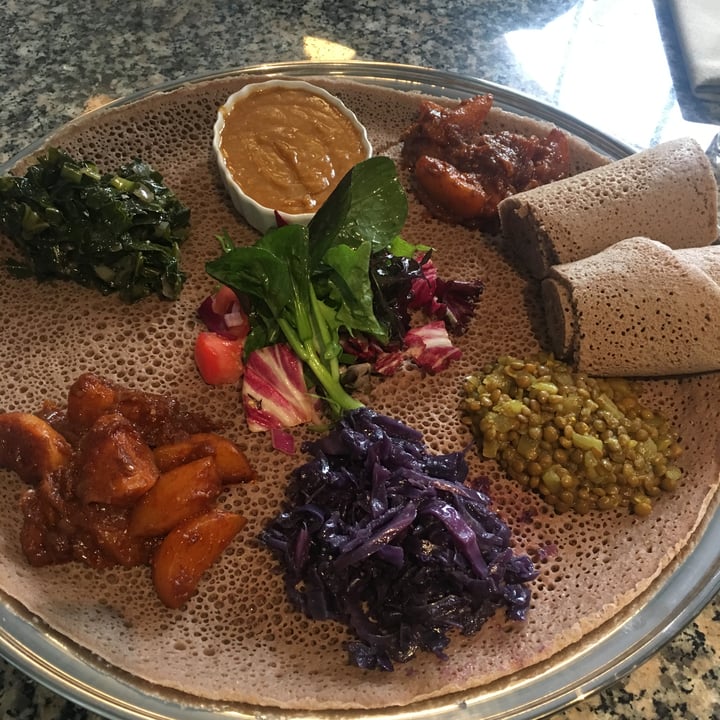 photo of Petit Valentien potato (Ye'dinich wat), chickpea porridge (shiro)' collard greens, red cabbage, green lentil shared by @auramoongreig on  21 May 2019 - review
