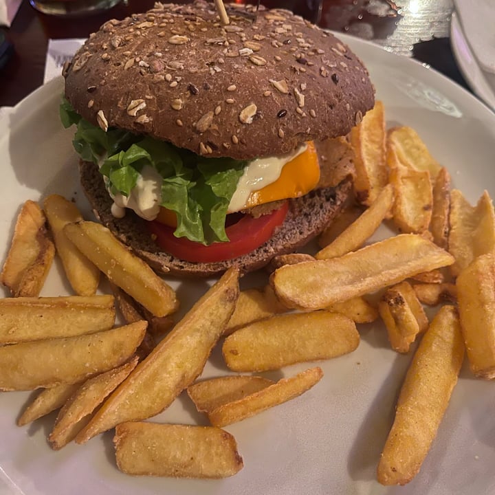 photo of The Millenium Autentico Irish Pub Original Guinness Deluxe burger beyond shared by @therealveganfox on  06 Nov 2022 - review